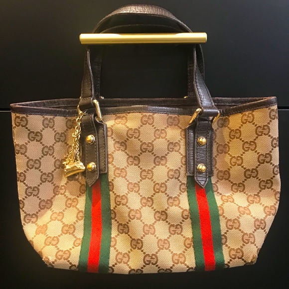 Small gucci handheld bag with gold charms - Picture 1 of 2
